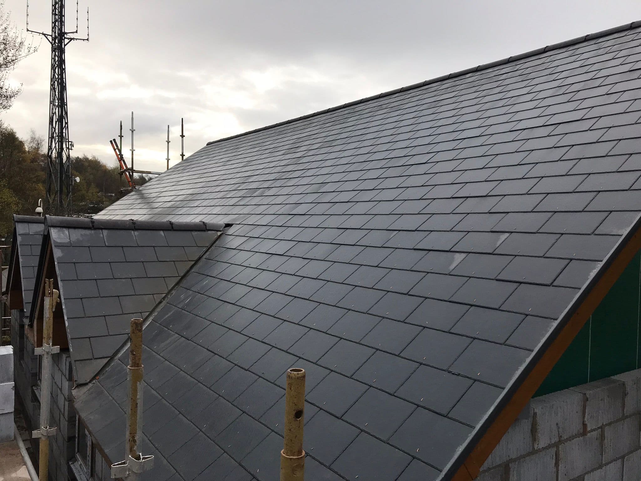 New fibre cement slate roof being installed